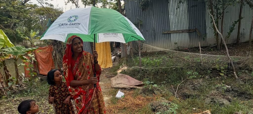 NSTU CATA Earth Team Distributes Umbrellas to Coastal Families in Hatiya